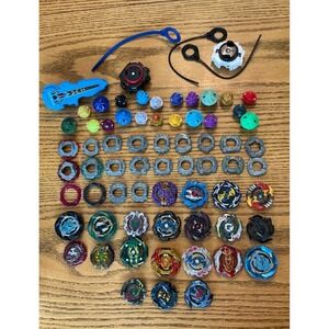 Huge Beyblade Burst Lot 73 piece Takara TOMY with Launchers Layers Discs Tips